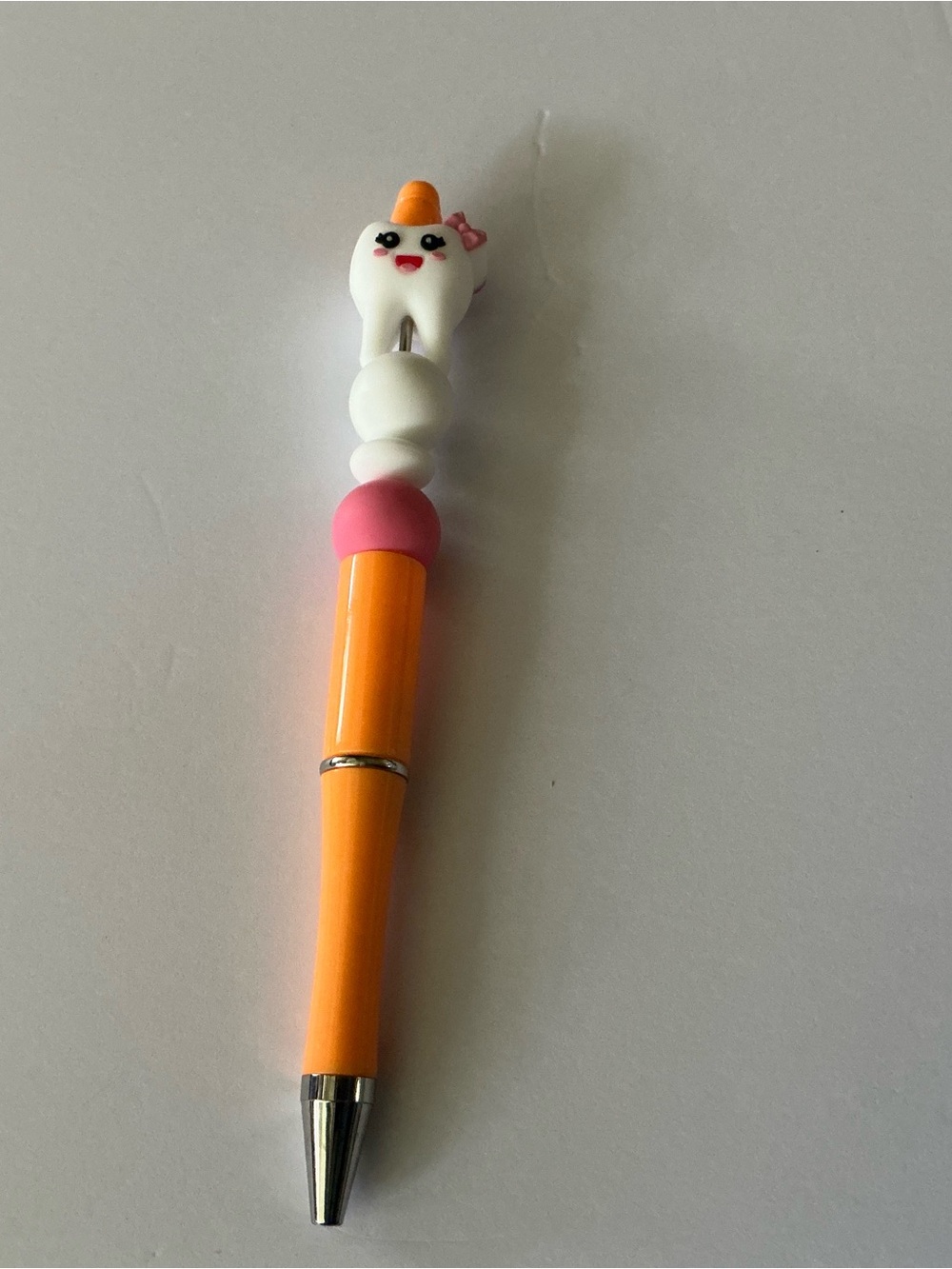 Cute Tooth Top Orange Pen with Pink Accent